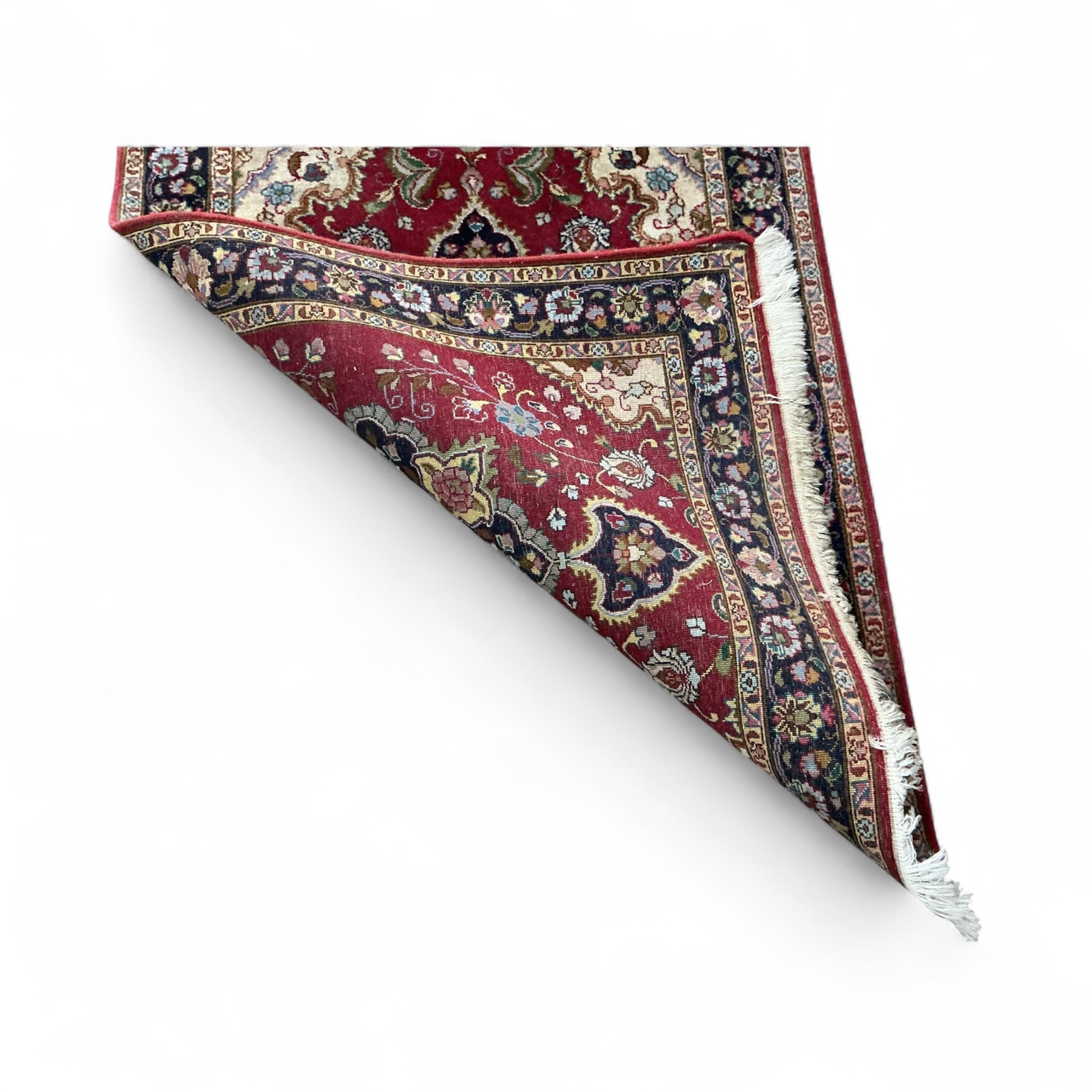 A North West Persian red ground runner, 310 x 55cm